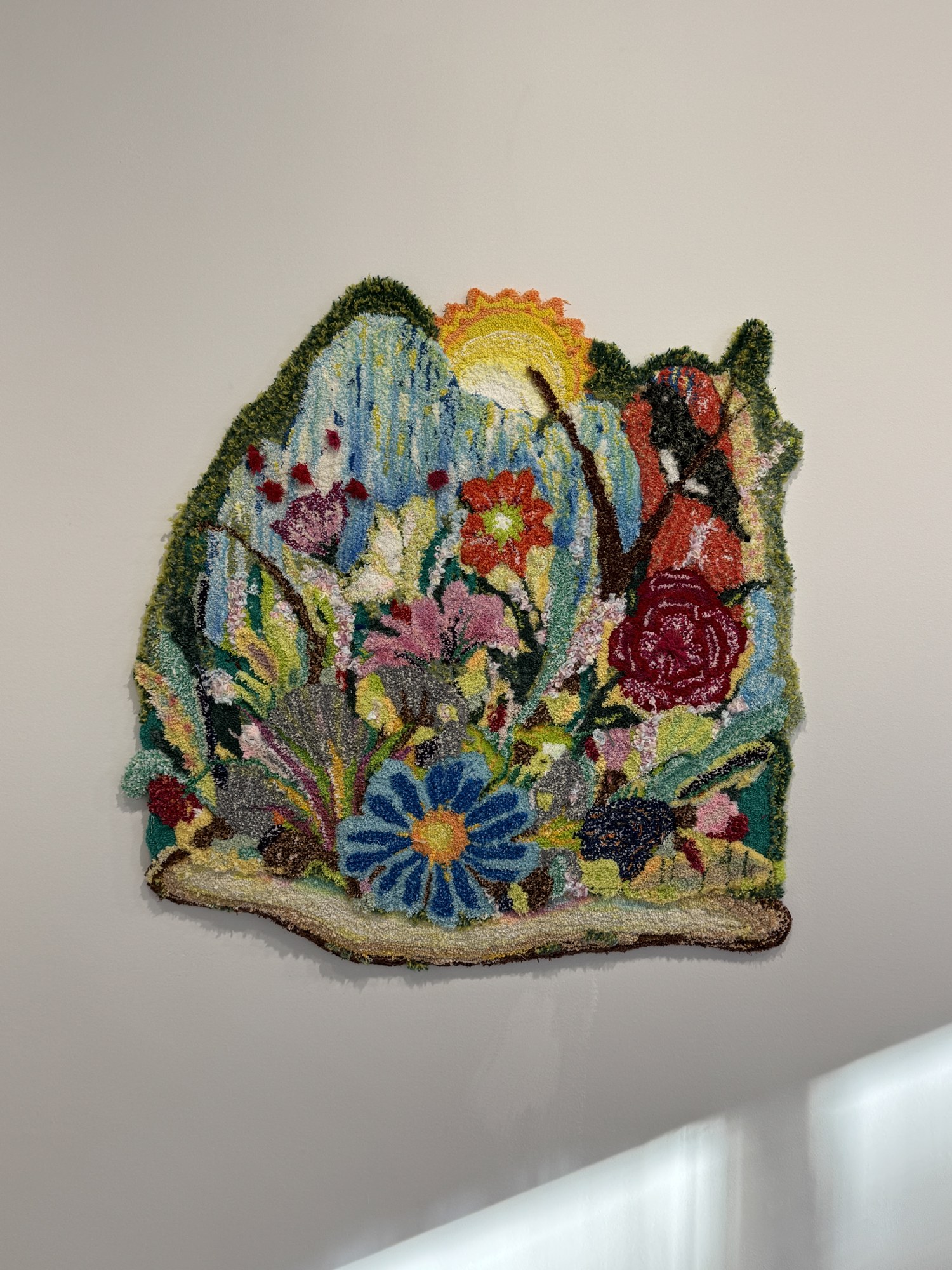 Finished floral tufted artwork from the PayPal project